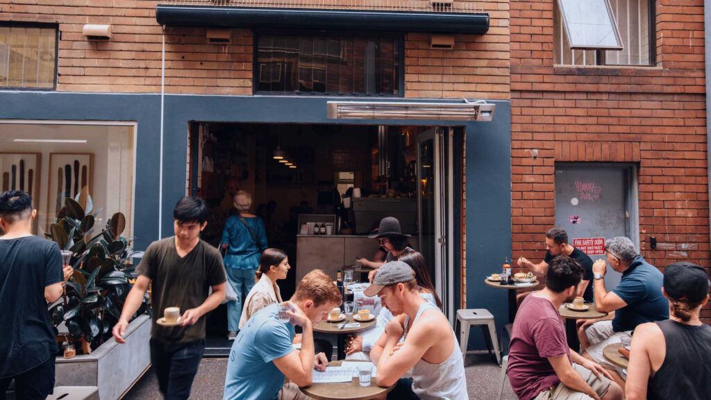 Room Ten café with communal seating in a quiet laneway of Potts Point, Sydney